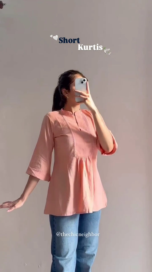 Trendy Peach Short Kurti with Flared Sleeves and Pleated Detailing – Casual Ethnic Top for Everyday Wear, Office, and College Outfits