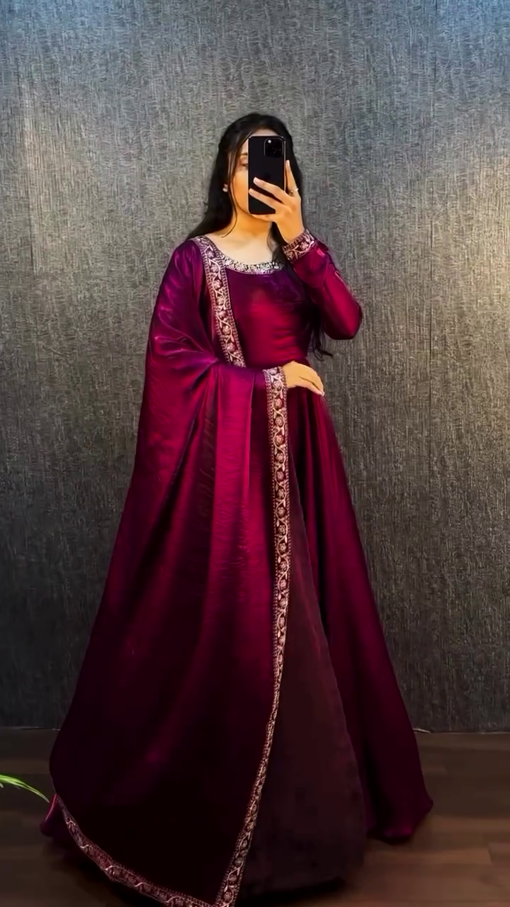 Elegant Maroon Satin Floor-Length A-line Dress with Intricate Embroidered Borders, Long Sleeves, and Traditional Ethnic Design