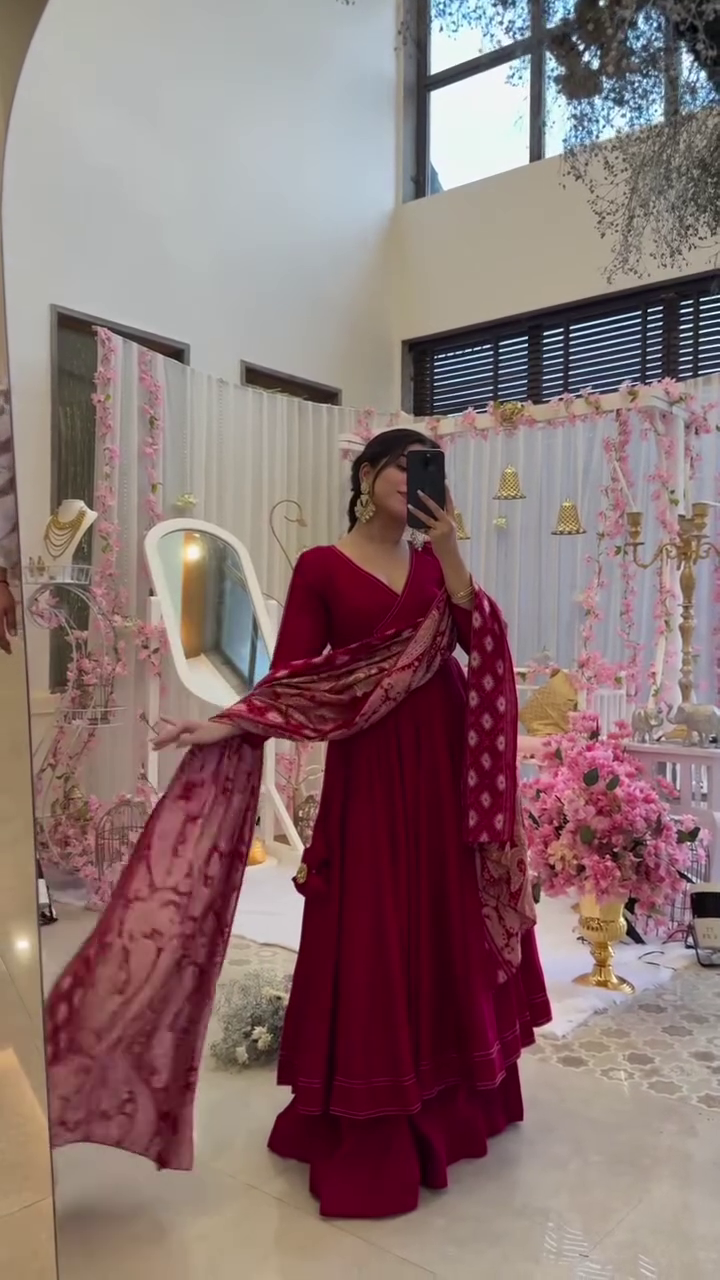 Beautiful Maroon Anarkali Dress with Elegant Printed Dupatta – Perfect for Weddings, Festive Celebrations, and Traditional Occasions. Featuring a Flowing Silhouette and Timeless Style.