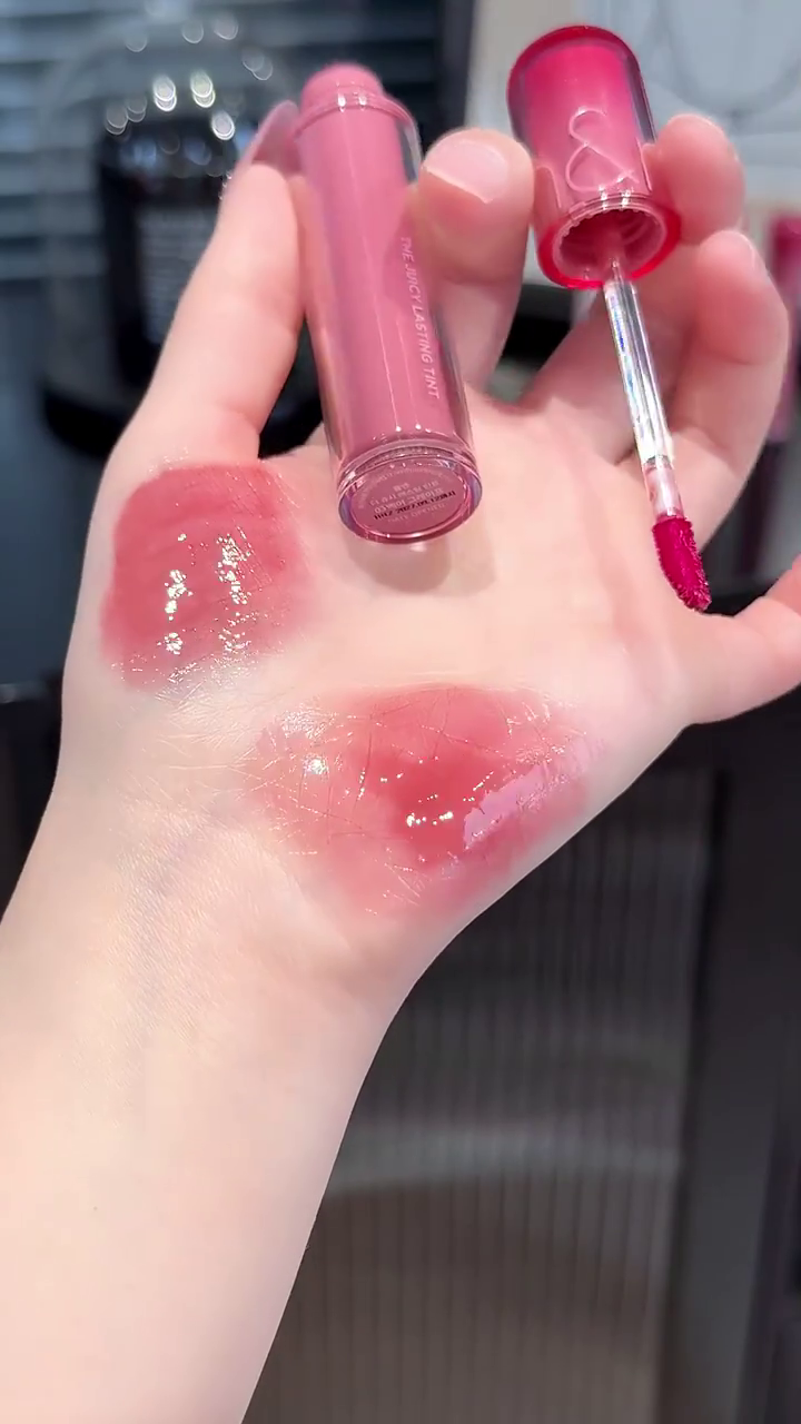 Glossy and Hydrating Juicy Lasting Tint in 03 Bare Grape and 17 Peach Me, Delivering Long-Lasting Shine and Moisture with a Vivid, Juicy Finish