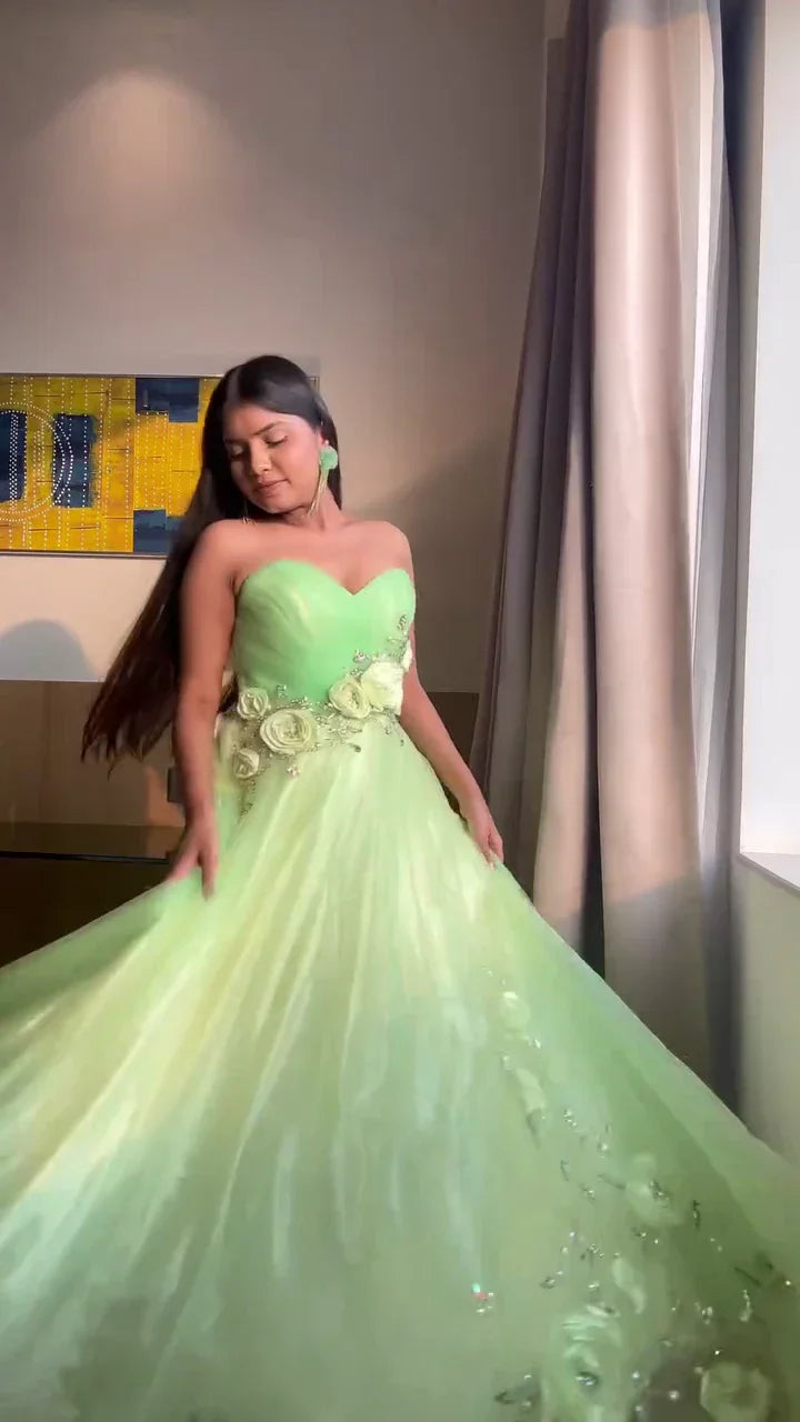 Designer Light Green Strapless Gown with Floral Embellishments and Flowing Layered Net Flair – Elegant Ethnic Party Wear and Reception Dress for Women