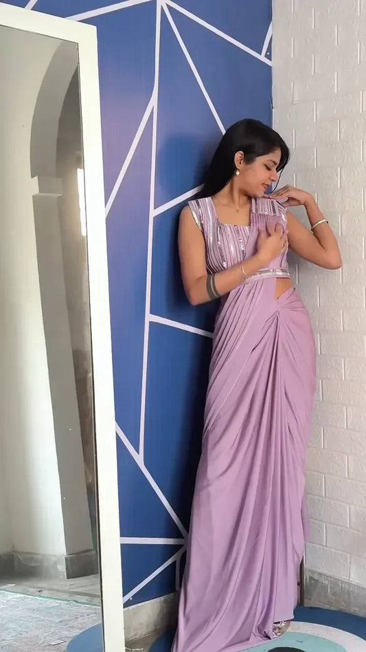 Lavender Saree with Silver Detailing on the Blouse and Pleats, Featuring a Modern Cut-Out Design for a Chic and Stylish Look