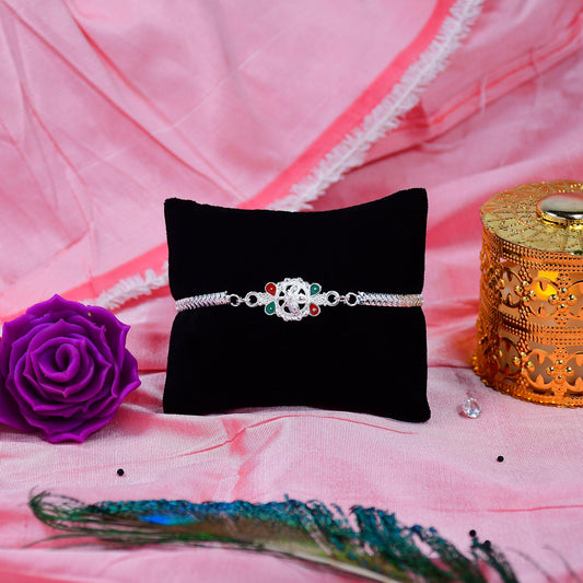 Delicate Metal Chain Rakhi with Enamel Floral Center