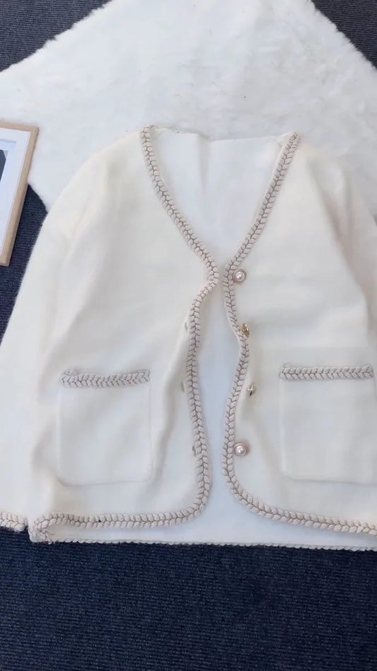 Elegant Long Knitted Cardigan with Pearl Buttons and Braided Trim – Classic Cream Winter Wear