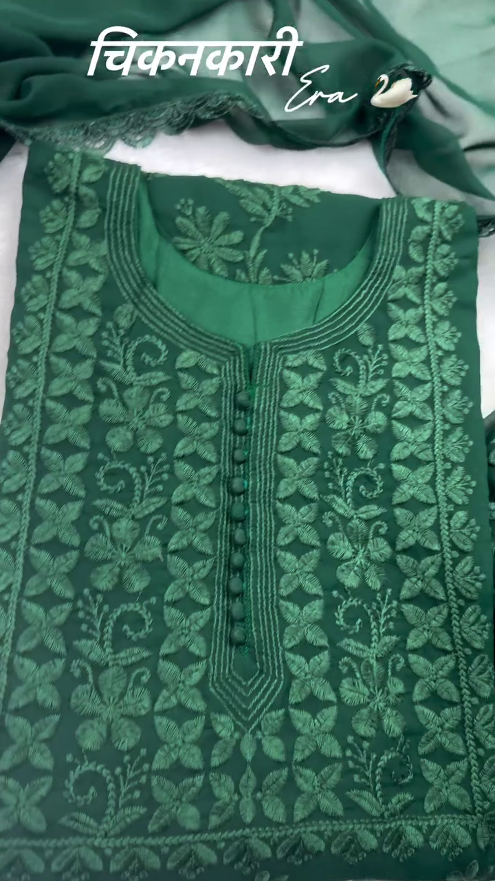 A beautiful green chikankari kurta set with delicate floral embroidery on the sleeves and dupatta, perfect for a traditional or festive look.     Ask ChatGPT