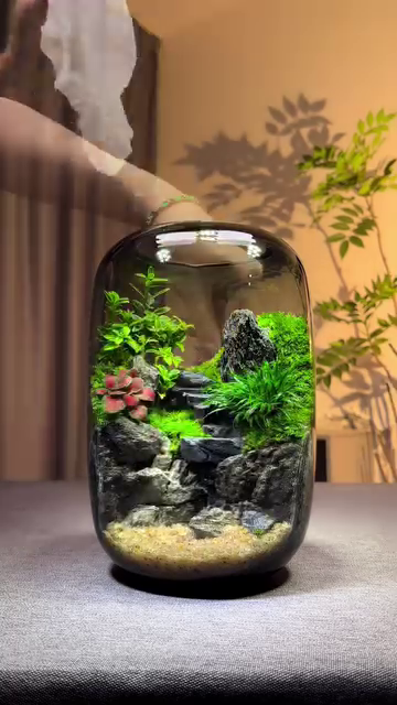 Elegant LED-Lit Desktop Waterfall Terrarium Aquarium – Handcrafted Glass Jar with Lush Aquatic Plants, Realistic Rock Landscaping, and Circulating Water Feature for Home or Office Decor
