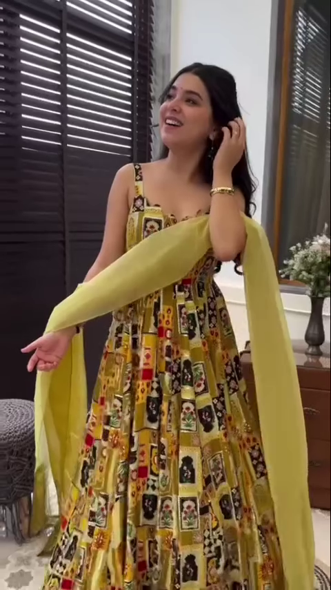 Vibrant Yellow Printed Anarkali Dress with Bold Artwork, Paired with a Contrasting Yellow Dupatta – Perfect for a Festive Look or Special Celebration