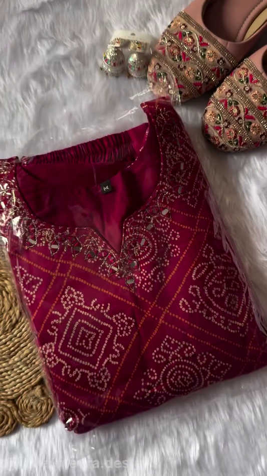 Maroon Printed Suit with Intricate Traditional Motifs, Embellished Neckline, and Matching Bottom for Festive and Casual Wea